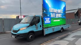 Mobile digital advertising vans display anti hate slogans at Villa Park Birmingham