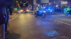 The Aston Villa players coach is given a police escort into Villa Park