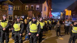 A pro Israeli protest is led away from Villa Park by a large police presence