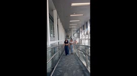 Woman Nearly Gets Pantsed As Friend Trips