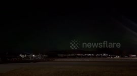 Aurora borealis lights up the night sky in Onalaska, Wisconsin