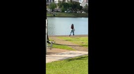 Woman rescues her dog from a river in Guarapuava, Brazil