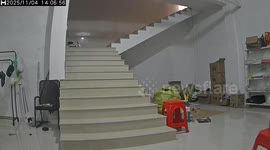 Woman slips while carrying child on stairs in Zhejiang, China