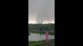Fish farmers flee as tornado tears through ponds in China