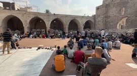 Palestinians perform Friday prayers amid rubble of Gaza’s Great Omari Mosque