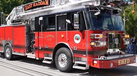 4k footage of small town firetruck / fire engine / firefighters at Memorial Day Parade