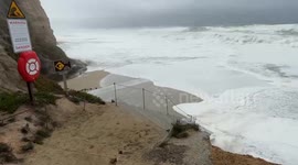 High king tide waves hit the shores of Half Moon Bay, California, USA