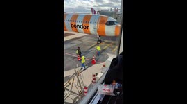 Airport Workers Play With Traffic Cones