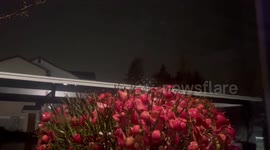 Nighttime downpour and gusty winds sweep in Milton, Washington