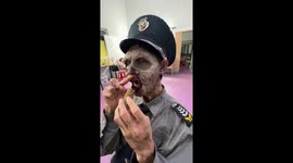 Zombie actor enjoys snack break in Zhejiang, China