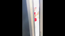 Adorable baby dressed as a chicken goes trick-or-treating in London, UK