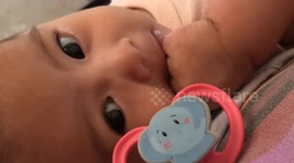 Baby makes unexpected gesture in Taguig, Philippines