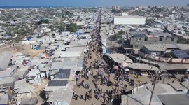 Drone captures activity in local bazaar in Khan Younis after Gaza ceasefire deal