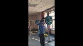 Man loses balance during heavy squat attempt in Inner Mongolia, China