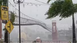 Super Typhoon Fung-wong shakes bridge as violent winds batter the Philippines