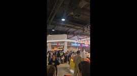 Python sparks panic when it emerges on shop roof inside mall