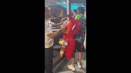 Passenger with giant doll-shaped rucksack causes laughter sending it through security scanner