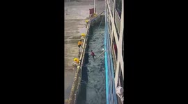 Passenger nearly falls into sea when the ship's plank breaks