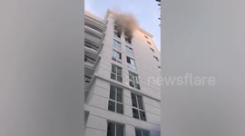 Tourists flee as fire rips through apartments in Pattaya