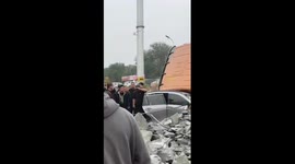 Truck overturns carrying heavy rocks on highway in Jiangsu, China