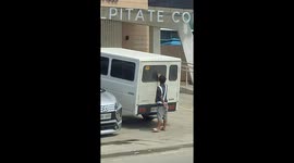 Man creates art from vehicle dust along McArthur Highway in Malolos, Bulacan, Philippines