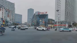 Motorcycle drifts and slides on the road in Fujian, China