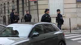 Former French President Sarkozy returns home after court orders release under judicial supervision (2)