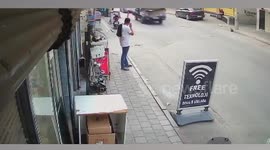Car smashes into supermarket and narrowly misses bystander
