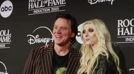 UNCAPTIONED: Jim Carrey and Taylor Momsen reunite 25 years after How the Grinch Stole Christmas