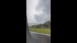 Passengers nervous as plane flies through Typhoon Fung-wong in the Philippines