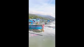 Fishermen sift through tropical storm aftermath in Vietnam