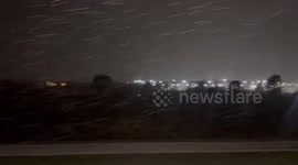 Heavy snow blankets streets during intense storm in Oswego, Illinois