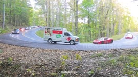 Sports Car Drifts Over Line, Hits Moving Truck