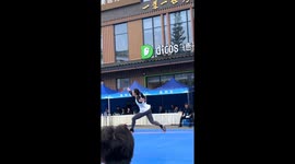 Female acrobat crosses garter in Sichuan, China