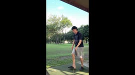 Golf lesson goes wrong when player swings and lets go of club