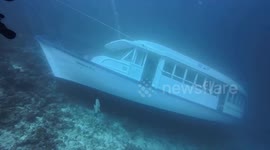 Tourists flee liveaboard diving boat as it sinks in the Maldives