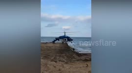 Helicopter tail snaps on landing before crashing into building