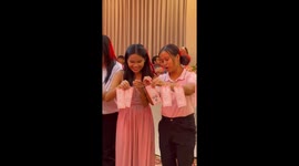 Wedding guests join in with amusing money string dance