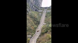 Car fails 300-metre-long  'Heaven's Stairway' challenge and crashes into guardrail