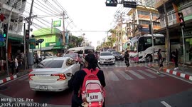 Drivers battle through chaotic heavy traffic in Bangkok