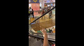 Rescue team saves boy with foot trapped in mall escalator