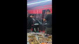 Playful punch leads to food spill at restaurant in Hunan, China