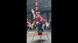 Young man achieves impressive bowl balancing feat in Hubei, China