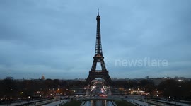 Eiffel Tower lights up to honor victims of Paris terror attacks