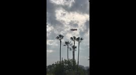 A striking Marty Supreme branded blimp glides above West Hollywood