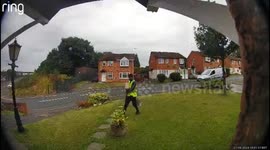 Dog chases delivery man in Birmingham, England, UK