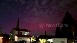 Rare pink aurora borealis lights up the sky over San Jose, California