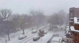 Snow blankets streets as winter arrives in Chicago, Illinois