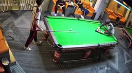 Pool player stuns friends with incredible fluke shot captured on CCTV