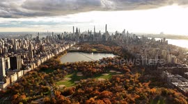 DRONE - Central Park blazes with fall color at sunset